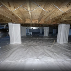 crawl space vapor barrier installed on floor and posts