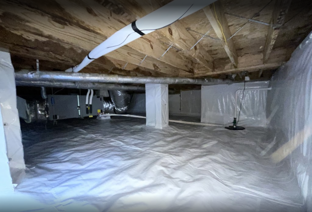 crawl space vapor barrier installed on floor and posts with sump pump