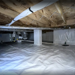 crawl space vapor barrier installed on floor and posts with sump pump