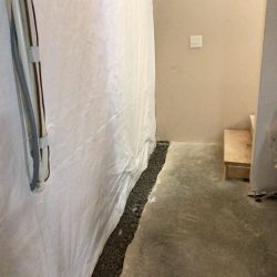 concrete breakout in basemnet with gravel fill to reduce hydrostatic pressure