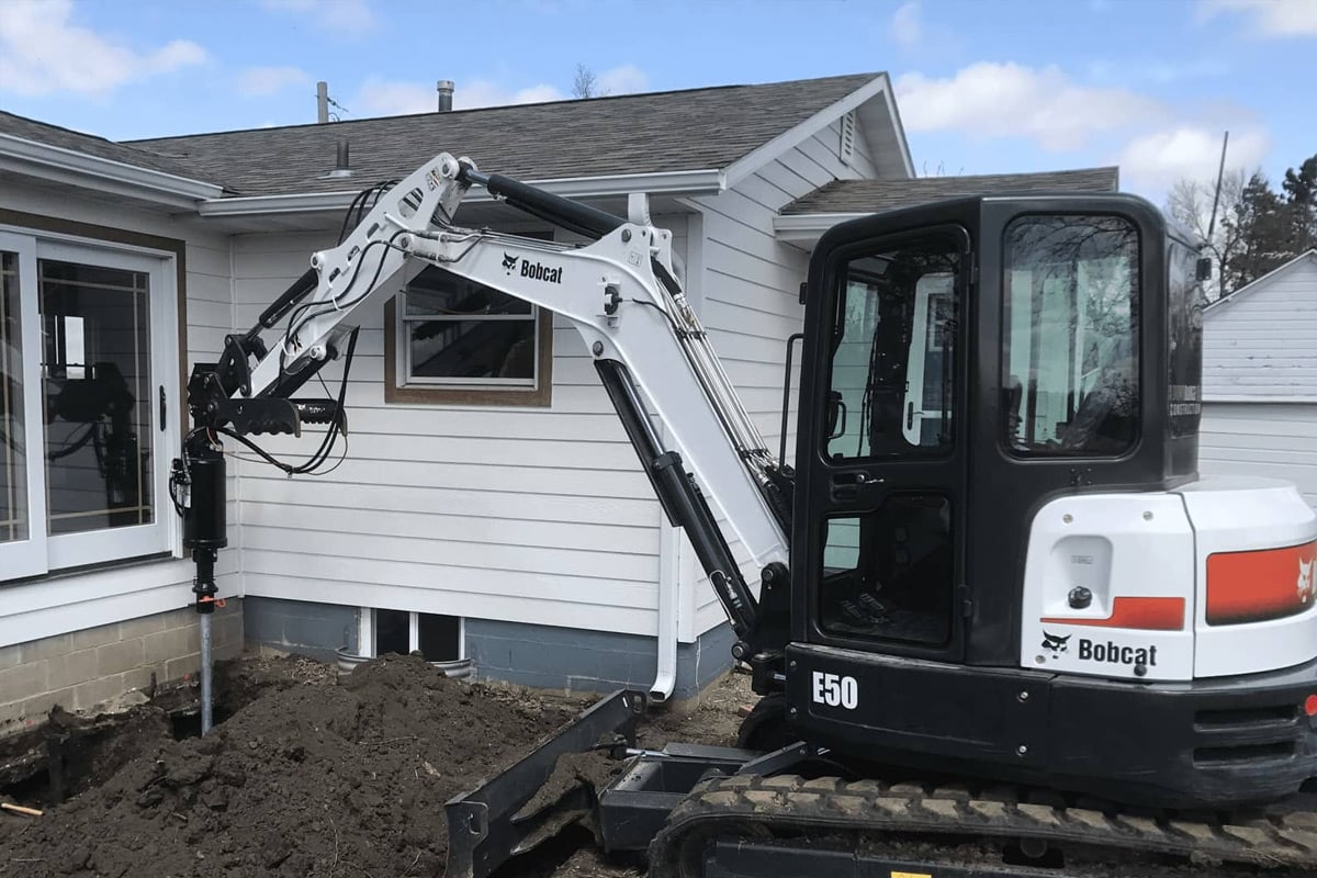Foundation repair service being performed on an Alabama home
