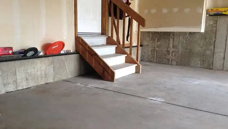Re-leveled garage floor with stairs touching the ground