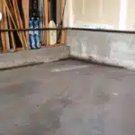 A garage exhibiting signs of moisture damage