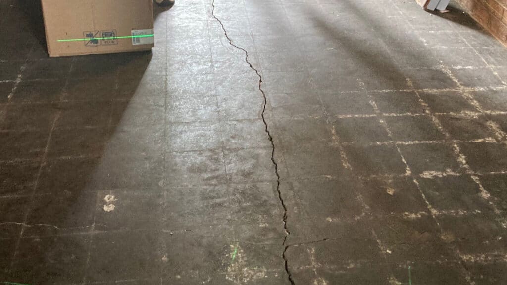 Cracked subfloor from water damage