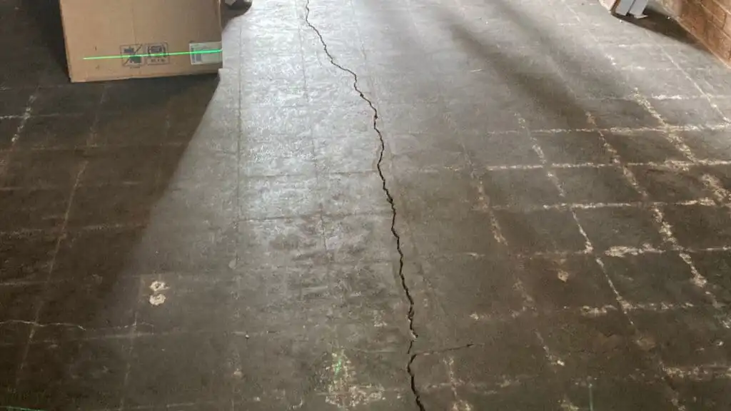 Cracked subfloor from water damage