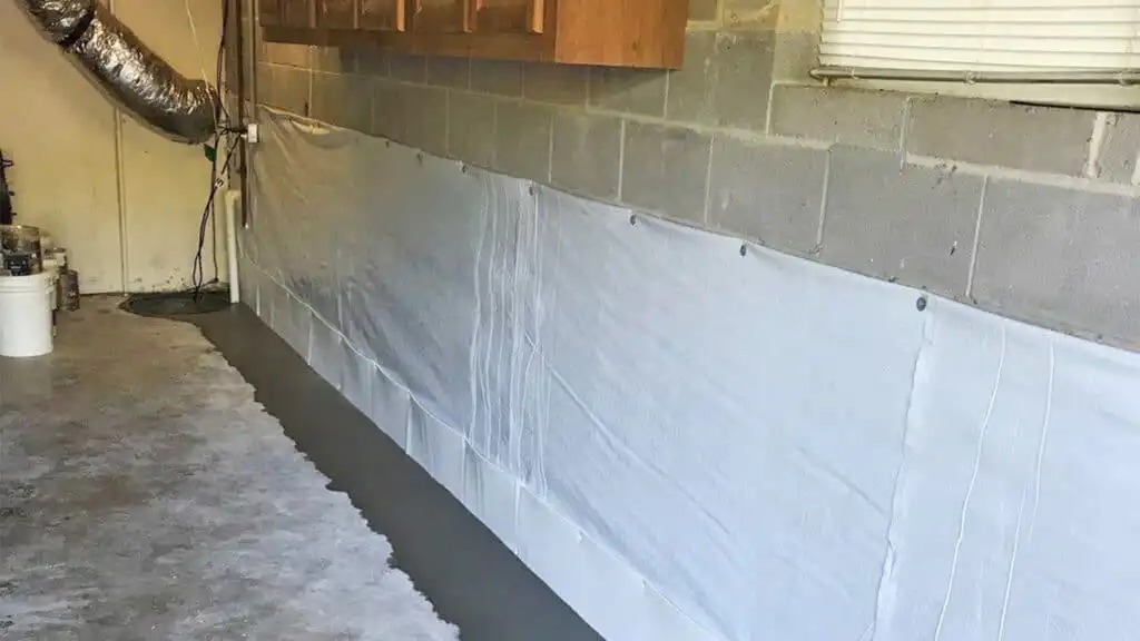Basement wall membrane installed for waterproofing