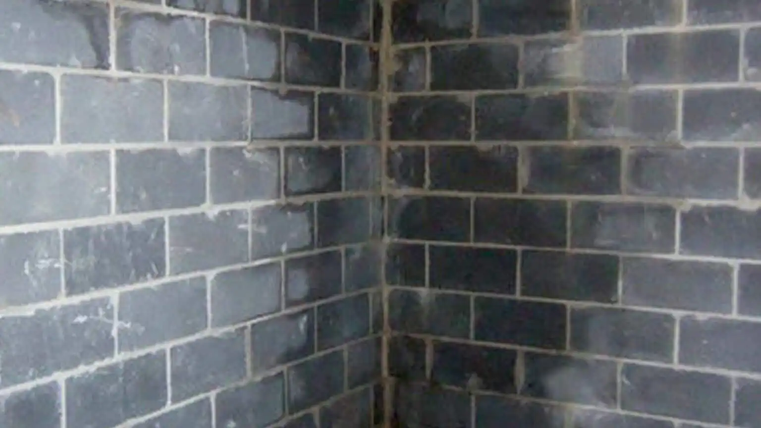 Basement wall showing signs of water staining