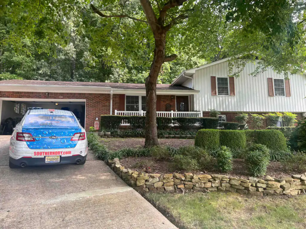 A SouthernDry car in the driveway of a customer's home