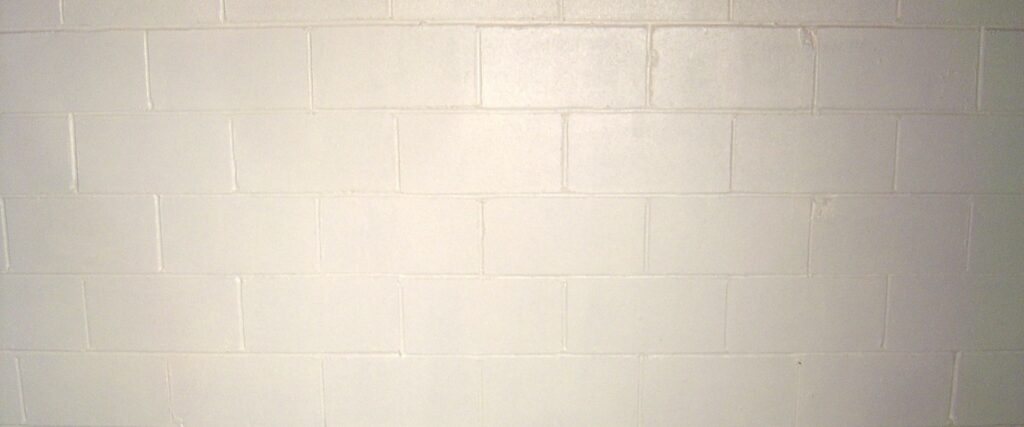 Epoxy wall coating on a basement wall