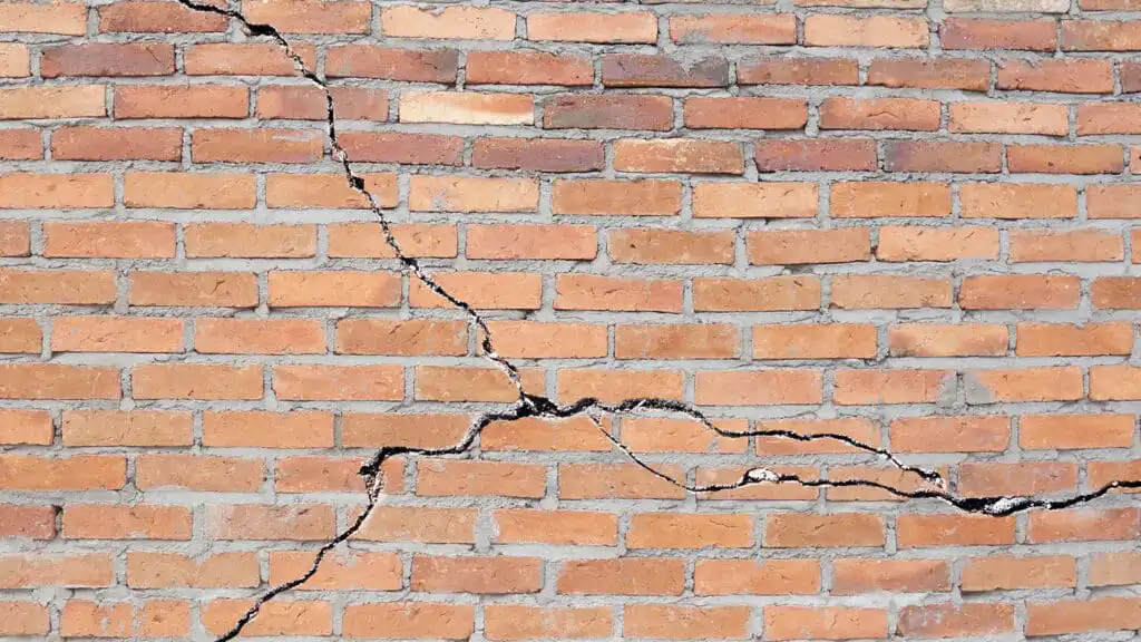 Cracks in a home's exterior foundation wall are a sign of foundation and waterproofing problems