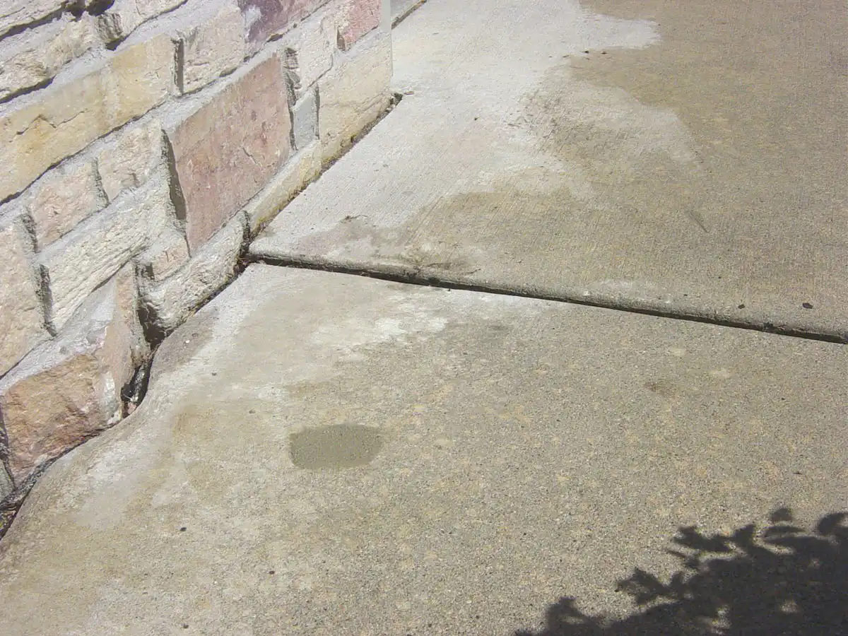 Leveled sidewalk next to home after concrete leveling