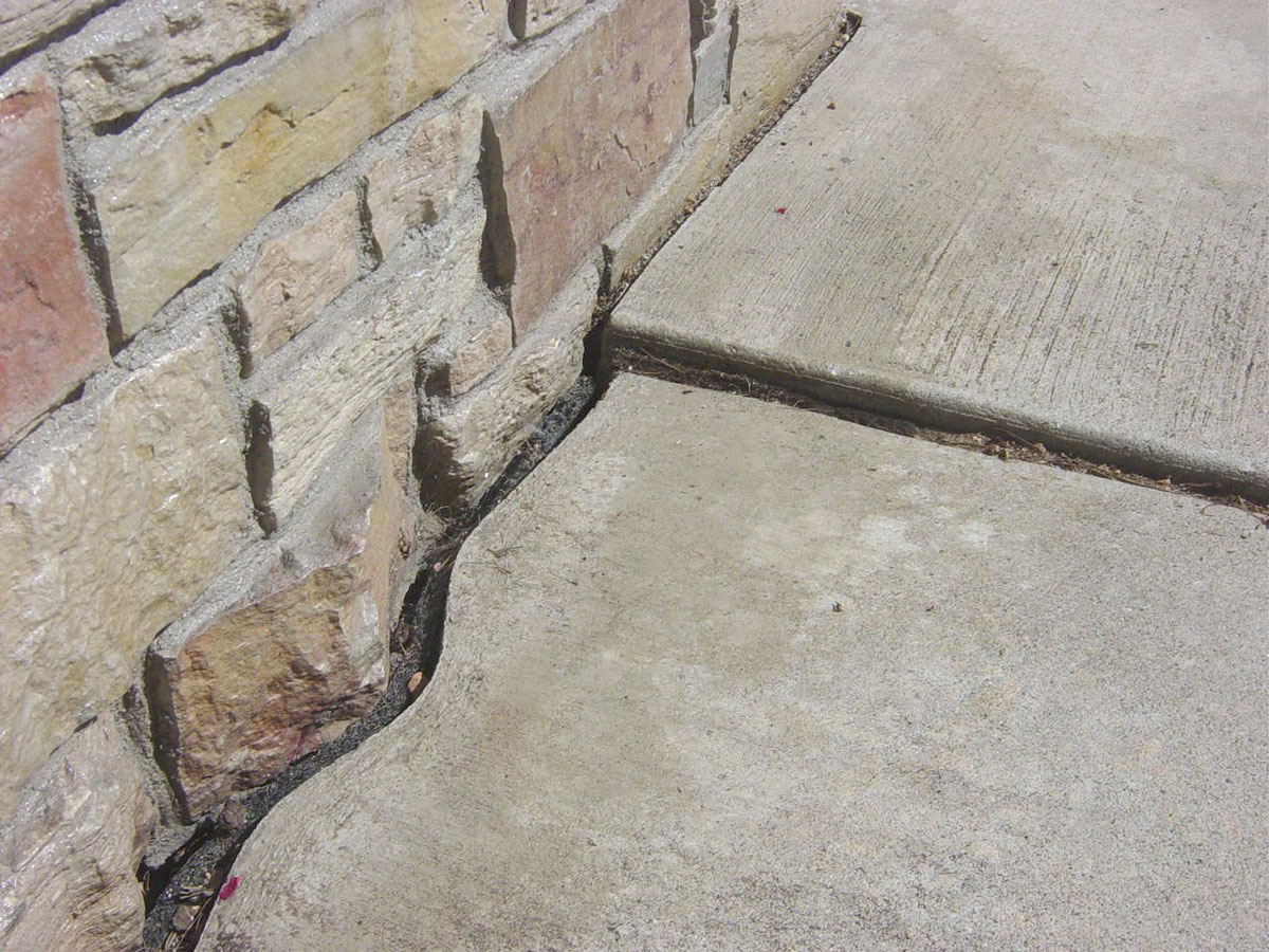 Sidewalk showing signs of sinking concrete